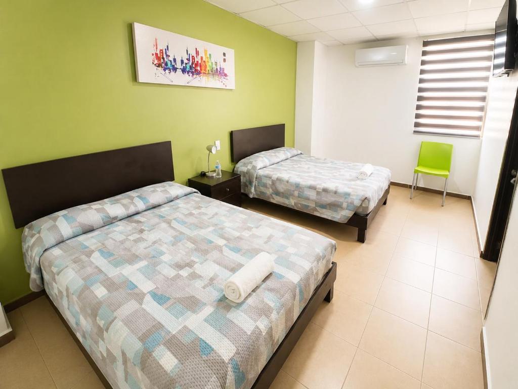 Room with two beds at Hotel Plazha Express